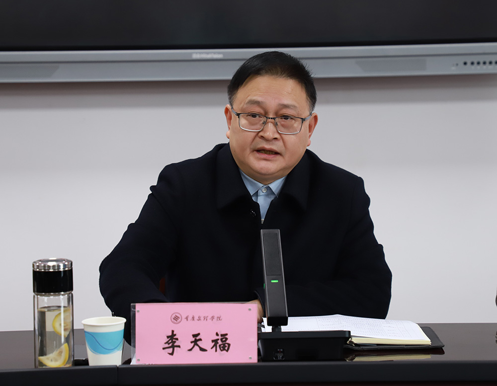 李校长照片缩剪.jpg